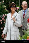 princess-caroline-of-hanover-l-and-her-brother-prince-albert-ii-of-monaco-smile-as-they-visit-...jpg